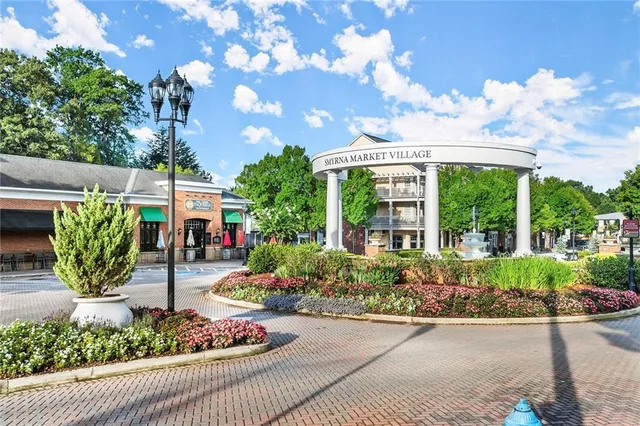 a view of a cafe with outdoor seating
