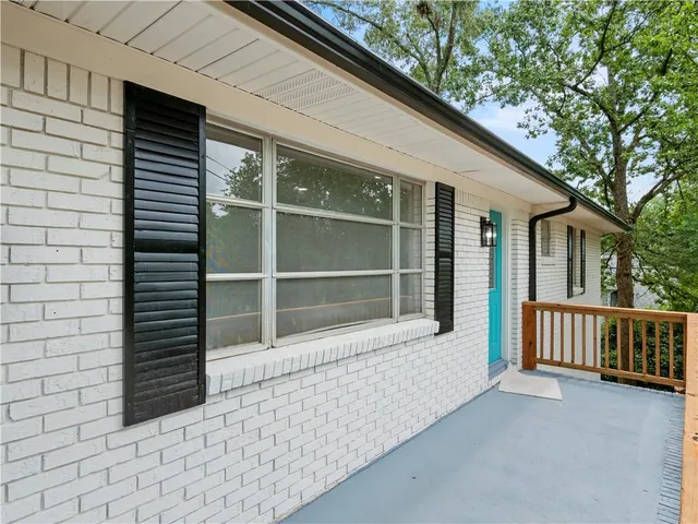 a view of a house with a large window