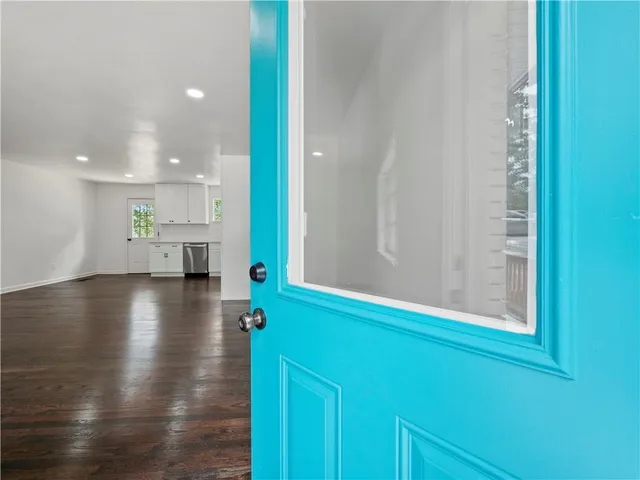 a view of kitchen with a table and chair