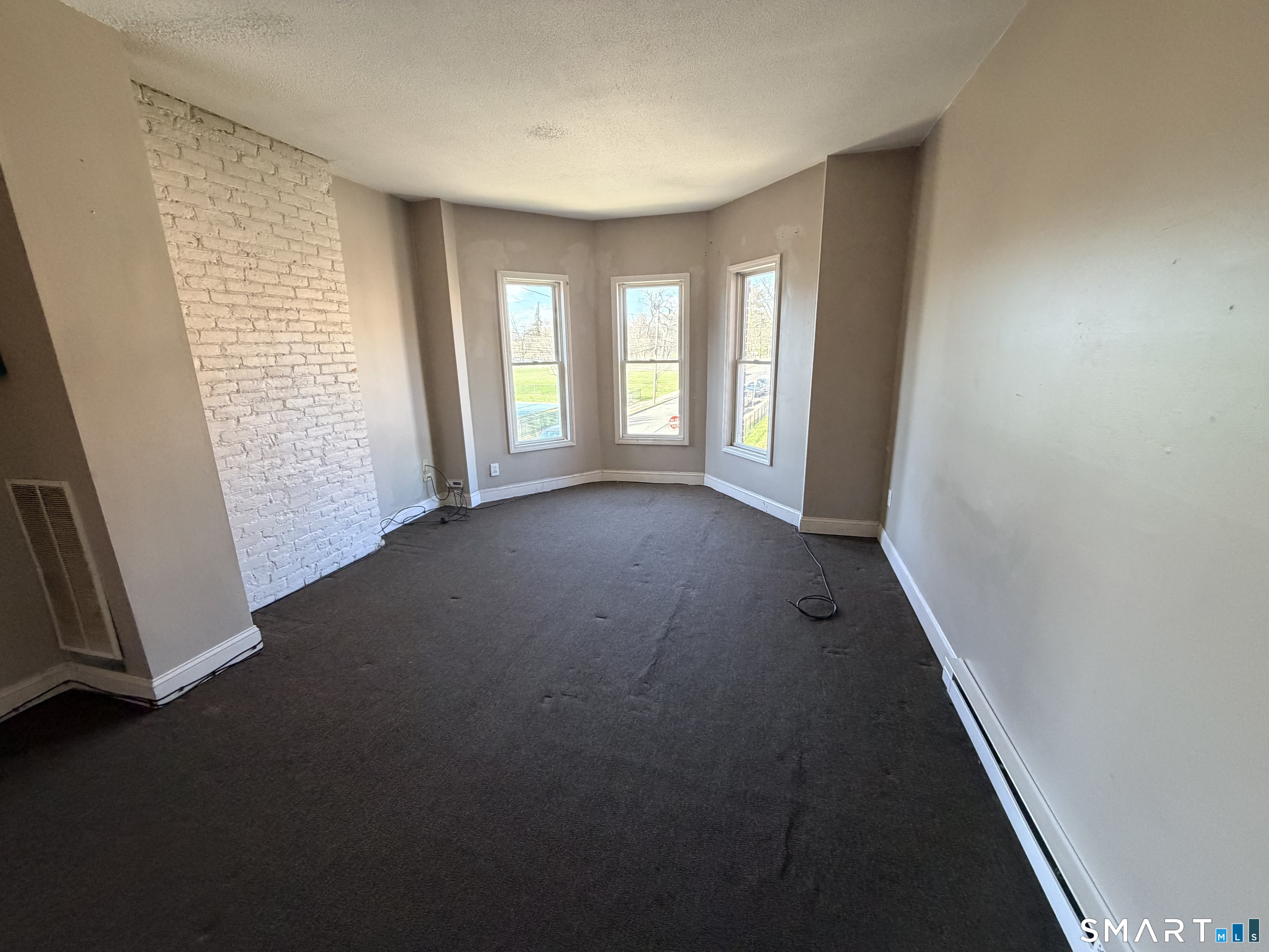51 Seyms Street, Unit 2 Hartford, CT 06120 - Photo 1 of 13 a view of hallway with windows