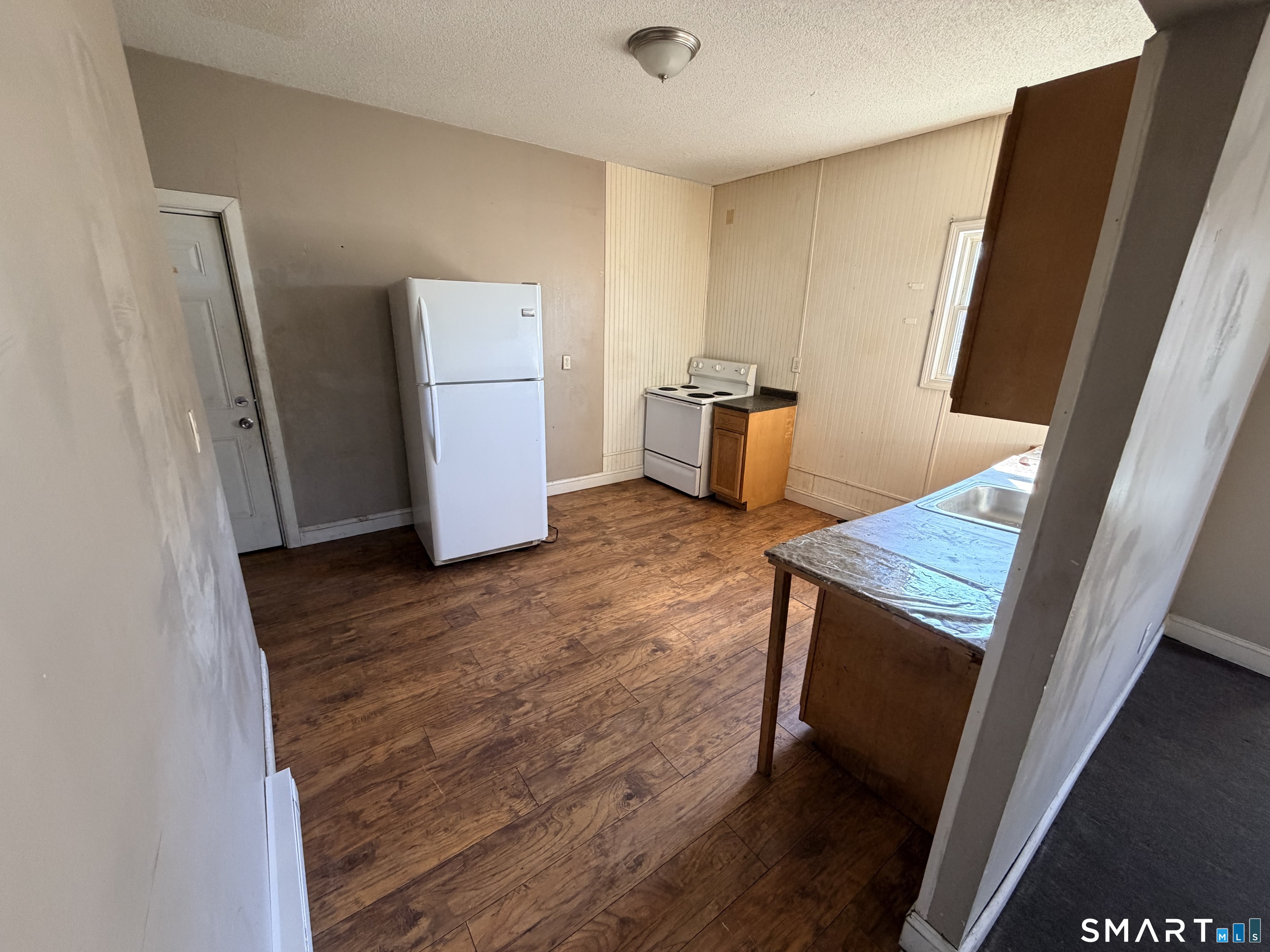 51 Seyms Street, Unit 2 Hartford, CT 06120 - Photo 12 of 13 a view of kitchen and wooden floor