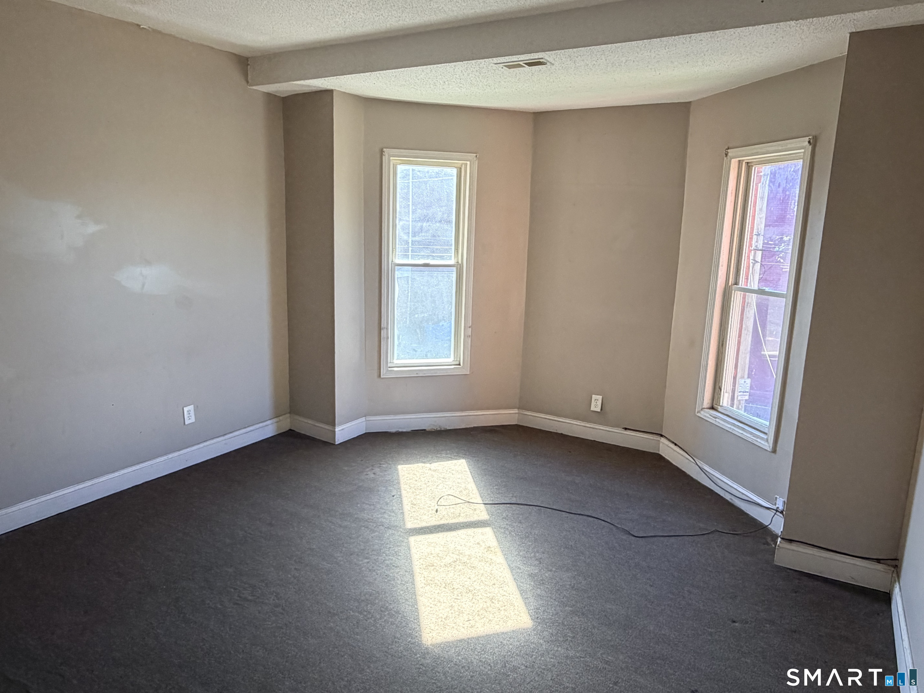 51 Seyms Street, Unit 2 Hartford, CT 06120 - Photo 2 of 13 a view of an empty room with a window