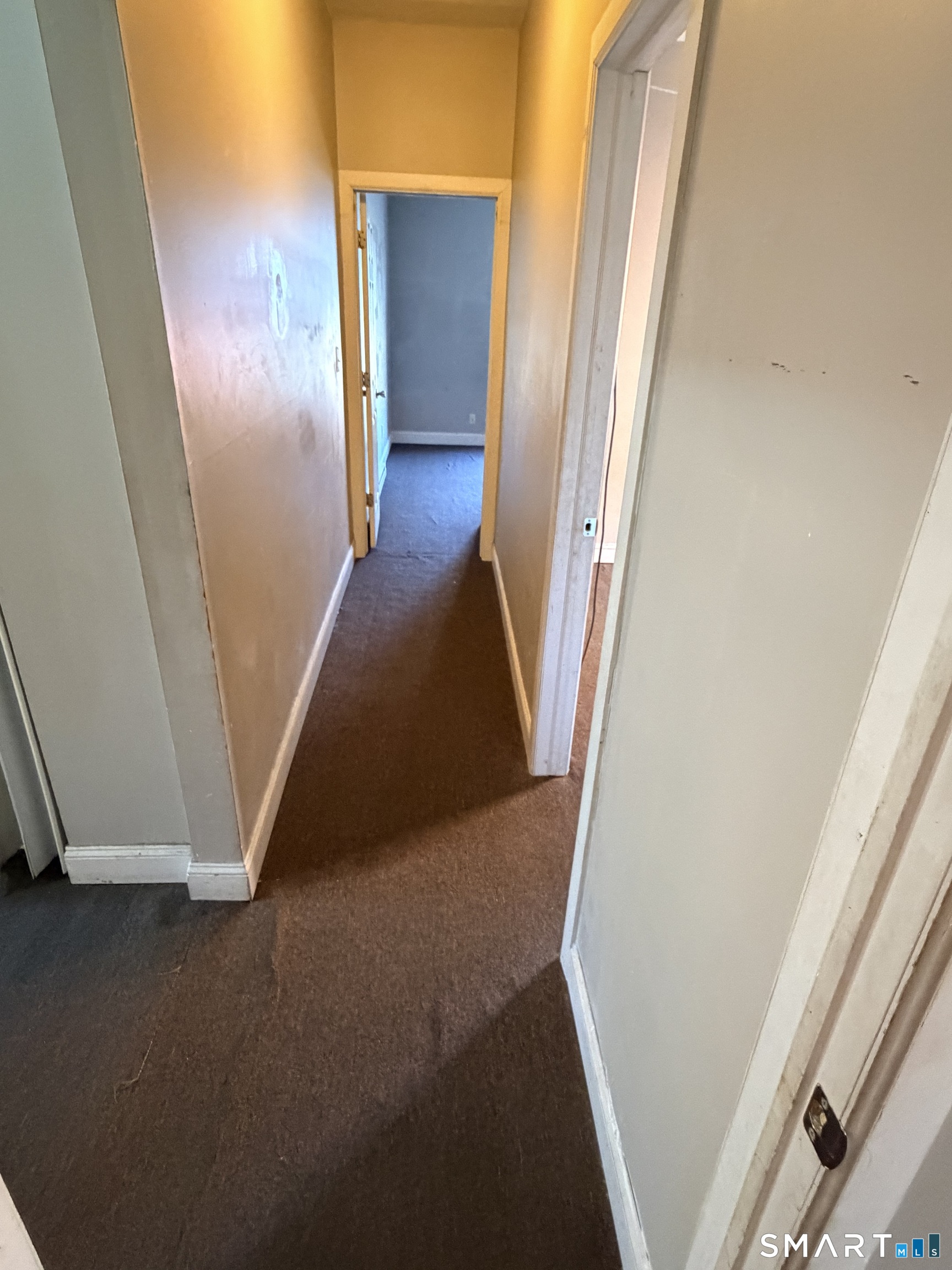51 Seyms Street, Unit 2 Hartford, CT 06120 - Photo 6 of 13 a view of a hallway with staircase