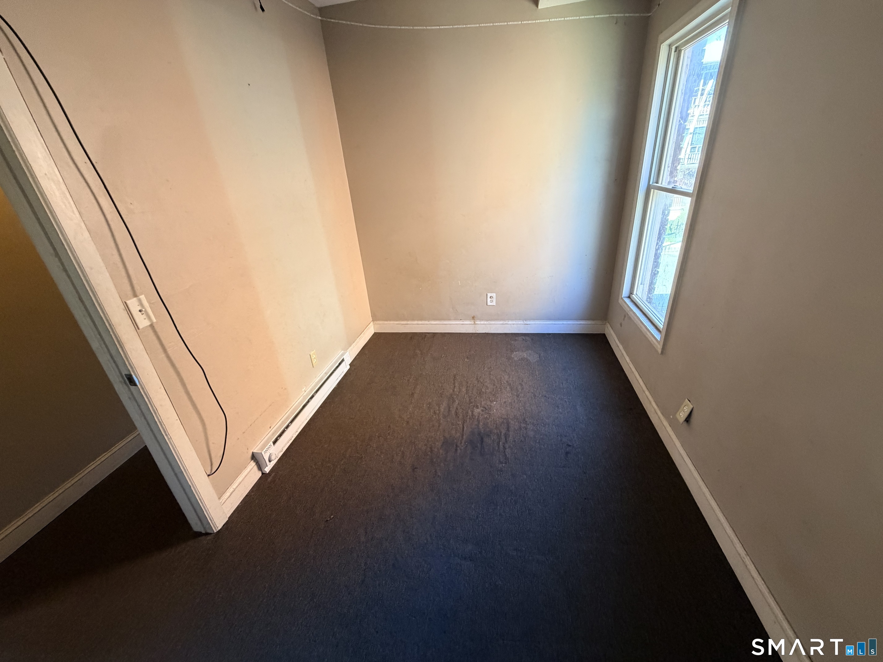 51 Seyms Street, Unit 2 Hartford, CT 06120 - Photo 7 of 13 a view of a hallway with wooden floor