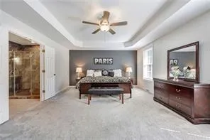 a bedroom with furniture and window