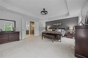 a view of a livingroom with furniture and a table