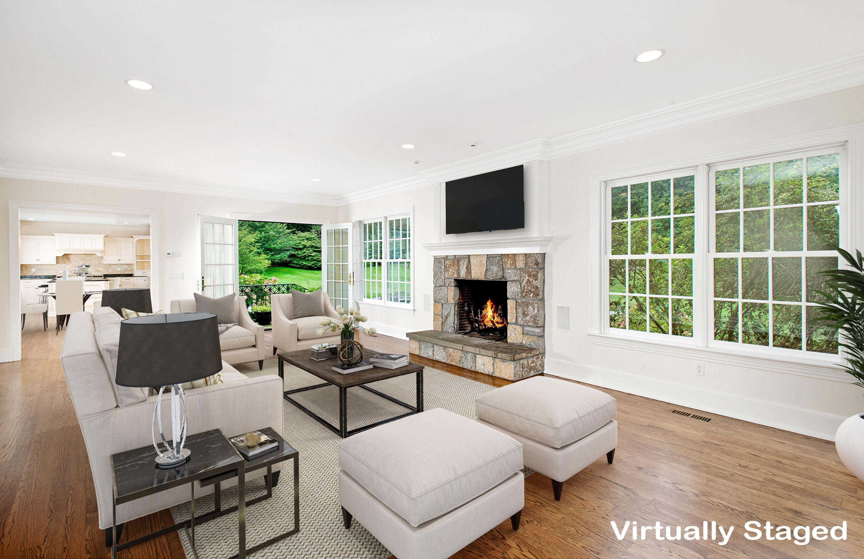 399 Wahackme Road New Canaan, CT 06840 - Photo 14 of 35 a living room with furniture and a fireplace