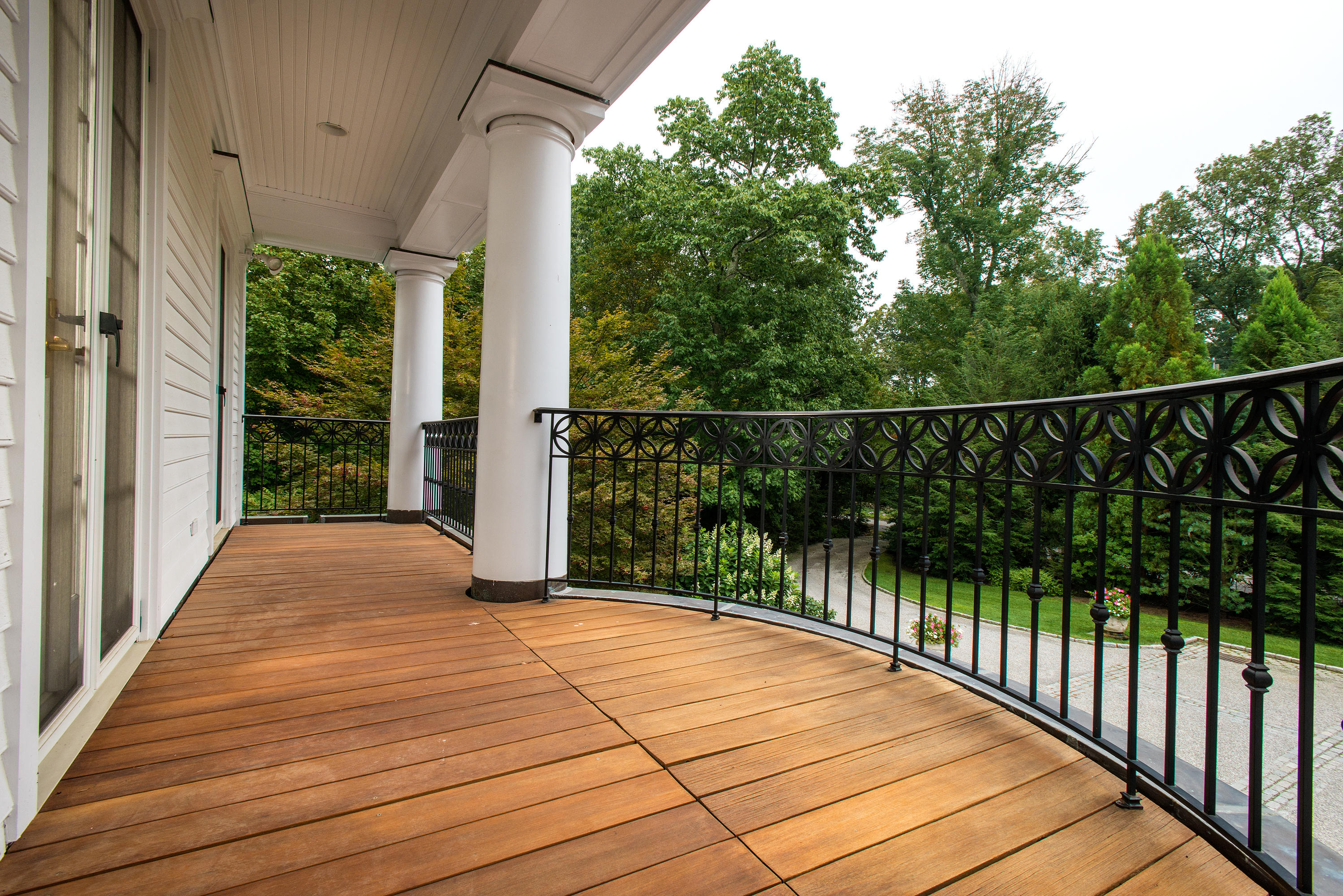 399 Wahackme Road New Canaan, CT 06840 - Photo 19 of 35 a balcony view with wooden floor
