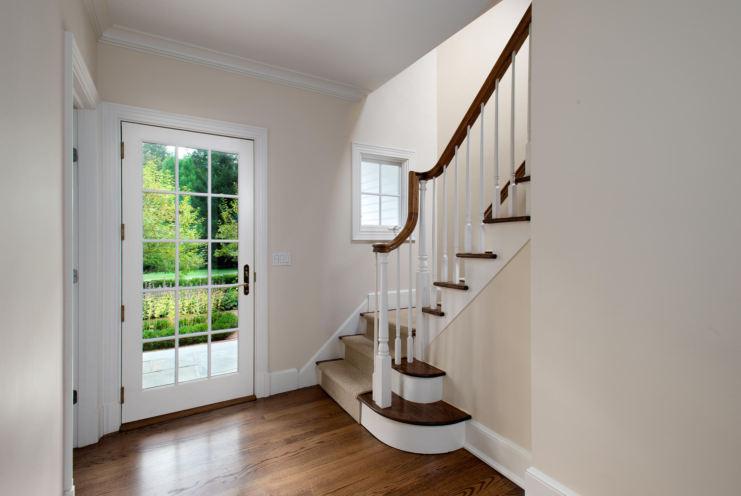399 Wahackme Road New Canaan, CT 06840 - Photo 27 of 35 a view of entryway with wooden floor and stairs