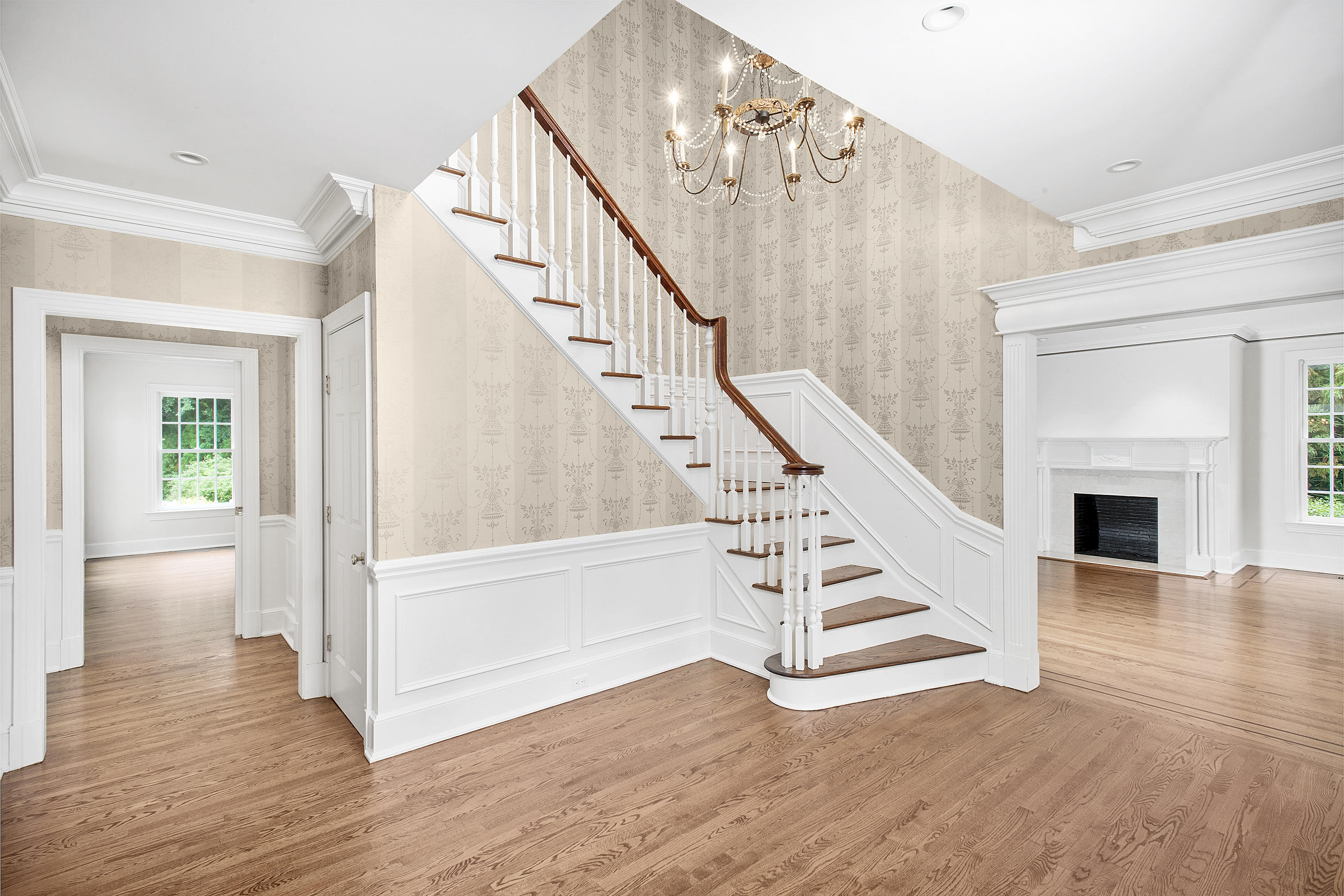 399 Wahackme Road New Canaan, CT 06840 - Photo 5 of 35 a view of entryway and hall with wooden floor
