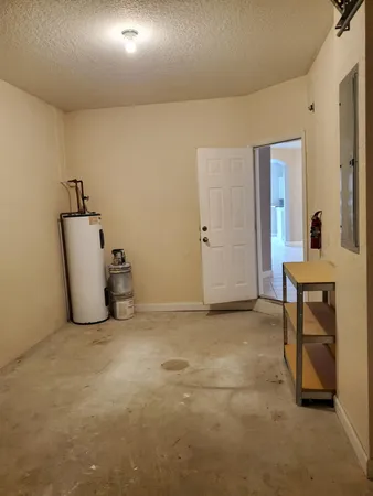 a view of a room with table and chair
