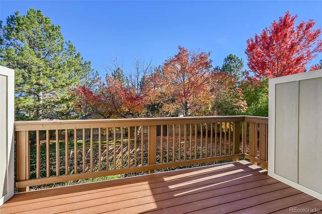 a balcony with wooden floor
