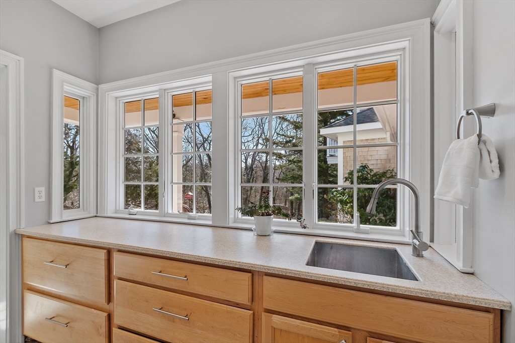 50 Castle View Drive Gloucester, MA 01930 - Photo 12 of 42 a view of a sink and a window with an outdoor view