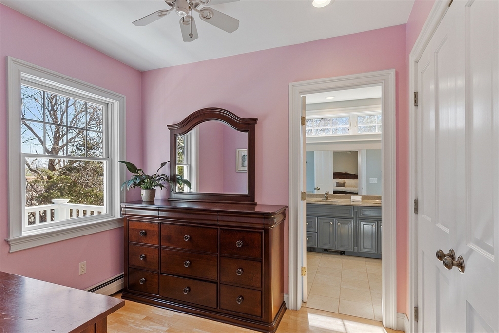 50 Castle View Drive Gloucester, MA 01930 - Photo 28 of 42 a bedroom with a bed and a dresser