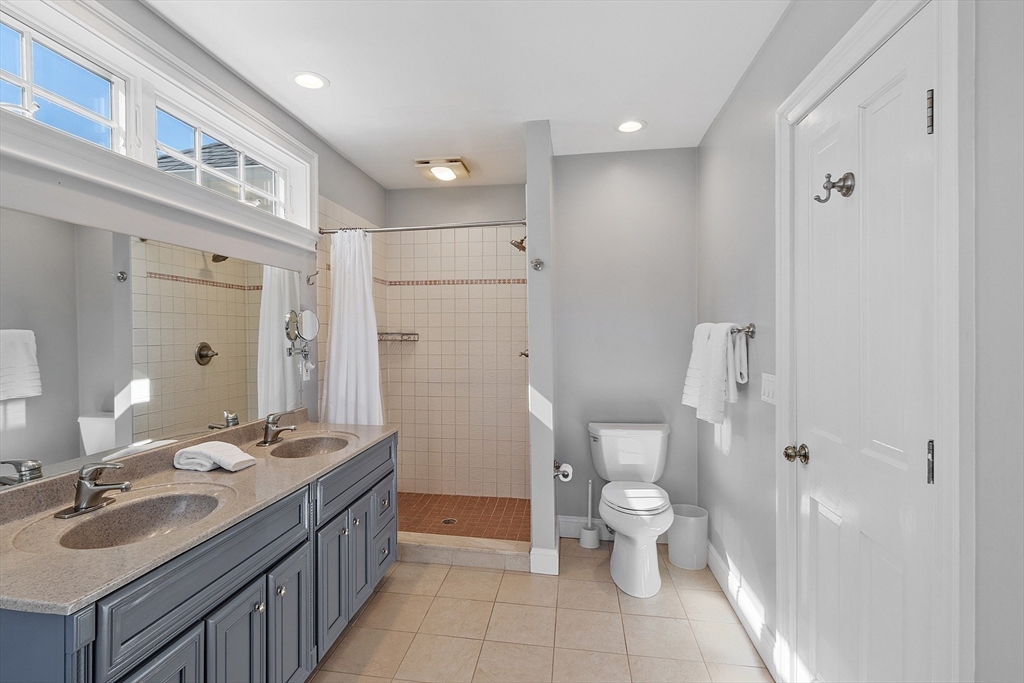 50 Castle View Drive Gloucester, MA 01930 - Photo 30 of 42 a bathroom with a sink toilet and shower