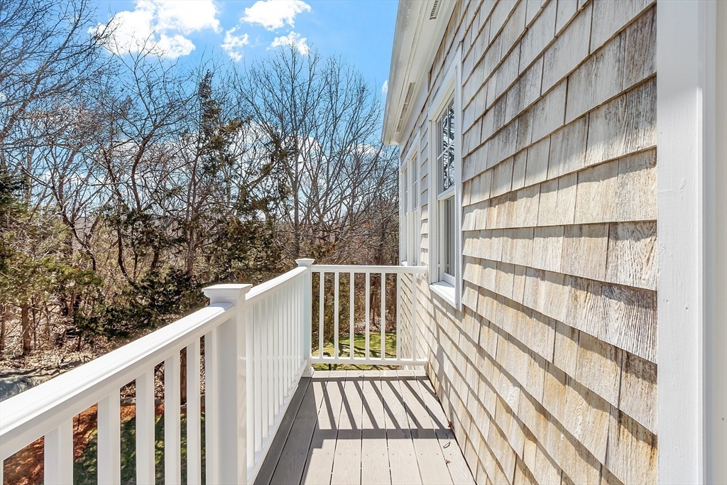 50 Castle View Drive Gloucester, MA 01930 - Photo 35 of 42 a view of balcony with wooden floor and fence