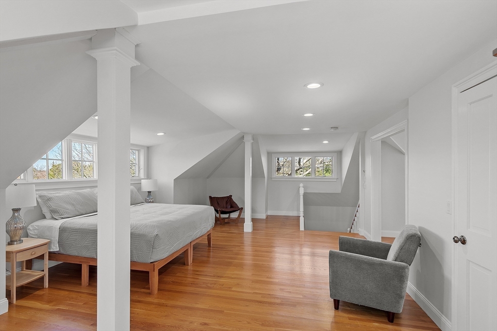 50 Castle View Drive Gloucester, MA 01930 - Photo 39 of 42 a living room with furniture and wooden floor