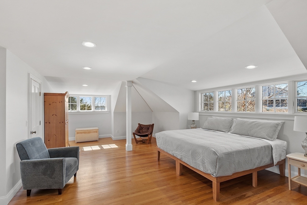 50 Castle View Drive Gloucester, MA 01930 - Photo 40 of 42 a bedroom with furniture and wooden floor