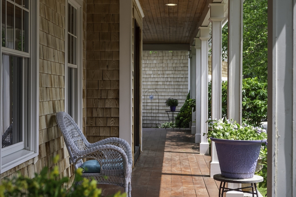 50 Castle View Drive Gloucester, MA 01930 - Photo 5 of 42 a view of balcony with chair and potted plant