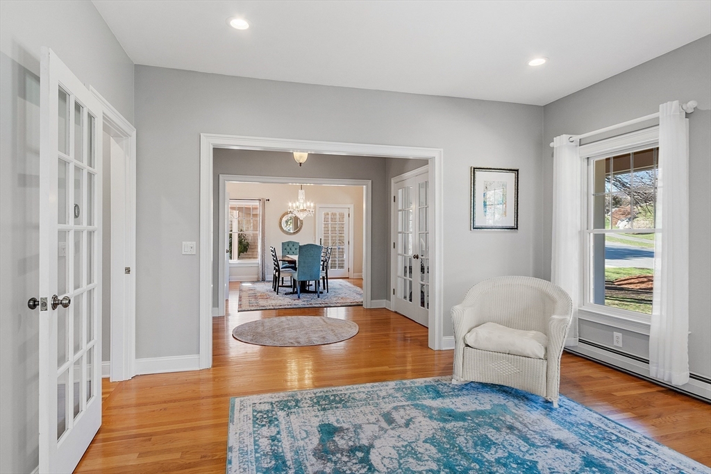 50 Castle View Drive Gloucester, MA 01930 - Photo 9 of 42 a living room with furniture and a large window