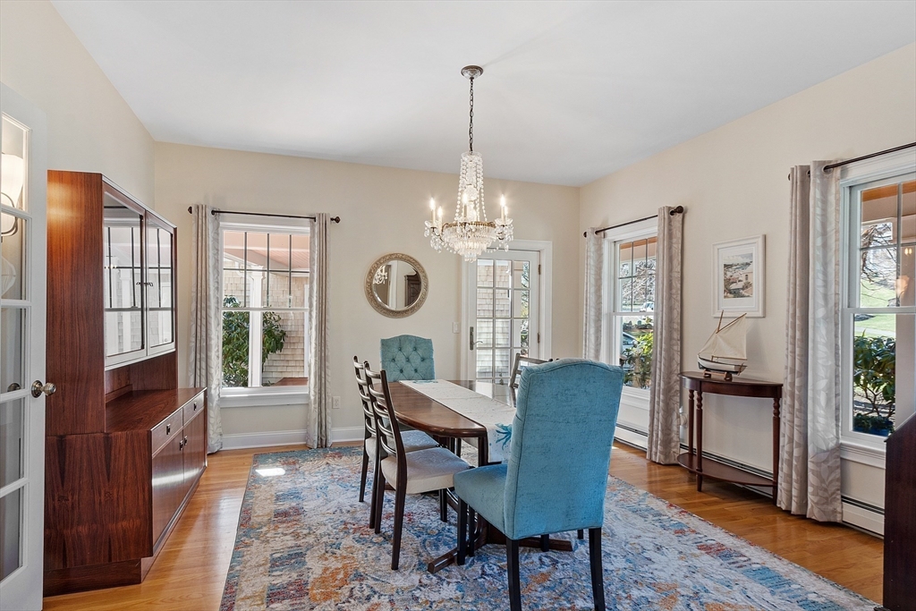 50 Castle View Drive Gloucester, MA 01930 - Photo 10 of 42 a view of a dining room with furniture window and wooden floor