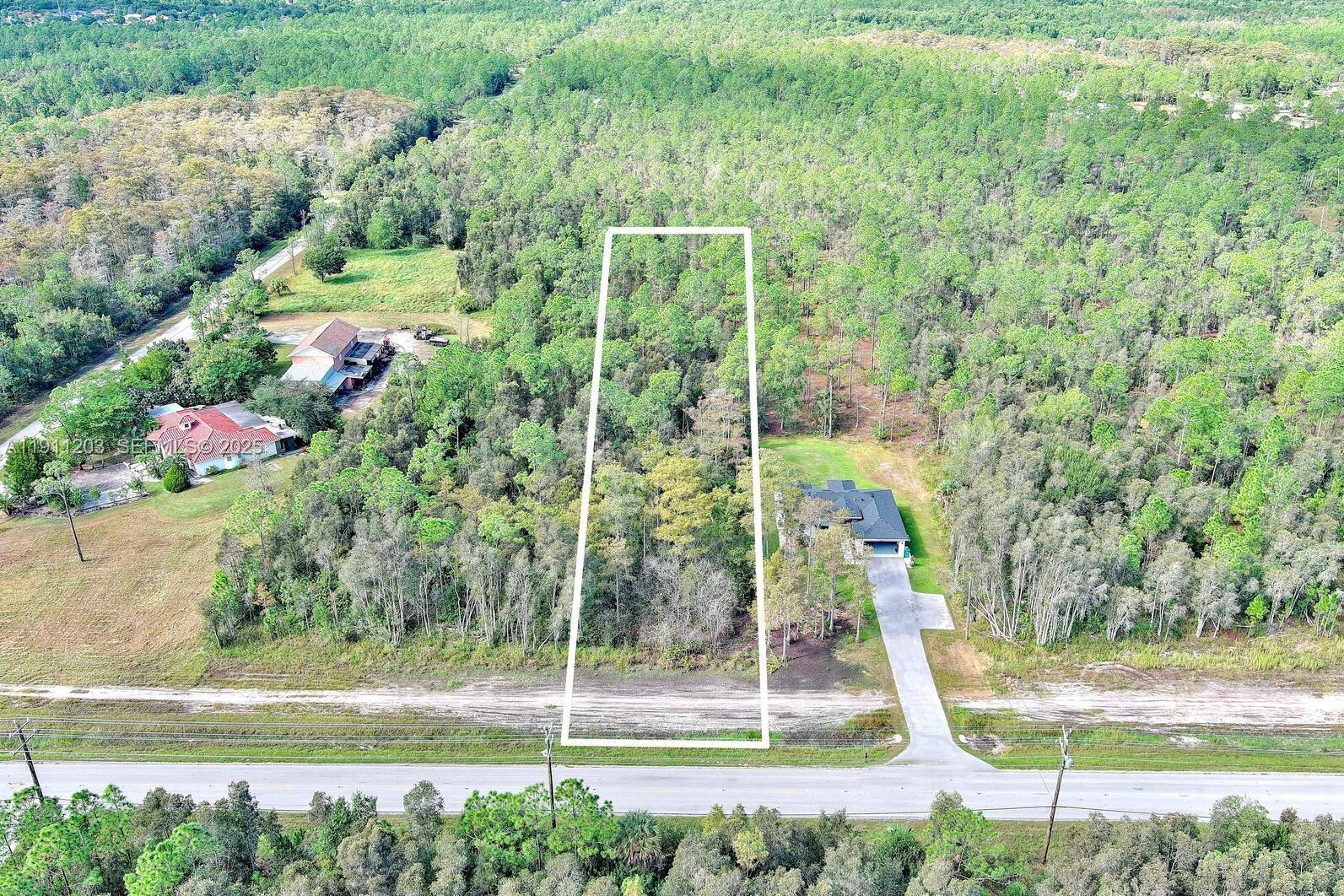 0 Everglades Boulevard North Naples, FL 34120 - Photo 6 of 16 a view of a garden