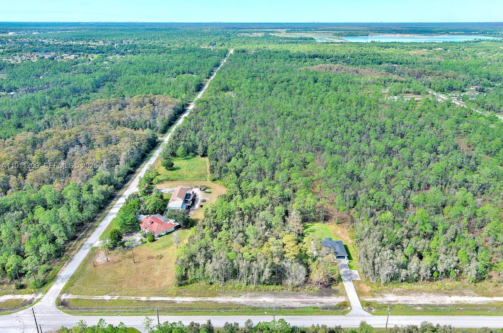 0 Everglades Boulevard North Naples, FL 34120 - Photo 10 of 16 a view of a yard with an outdoor space