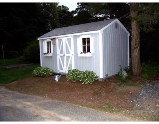 705 Wheeler Road Dracut, MA 01826 - Photo 3 of 11 a view of a back yard of the house