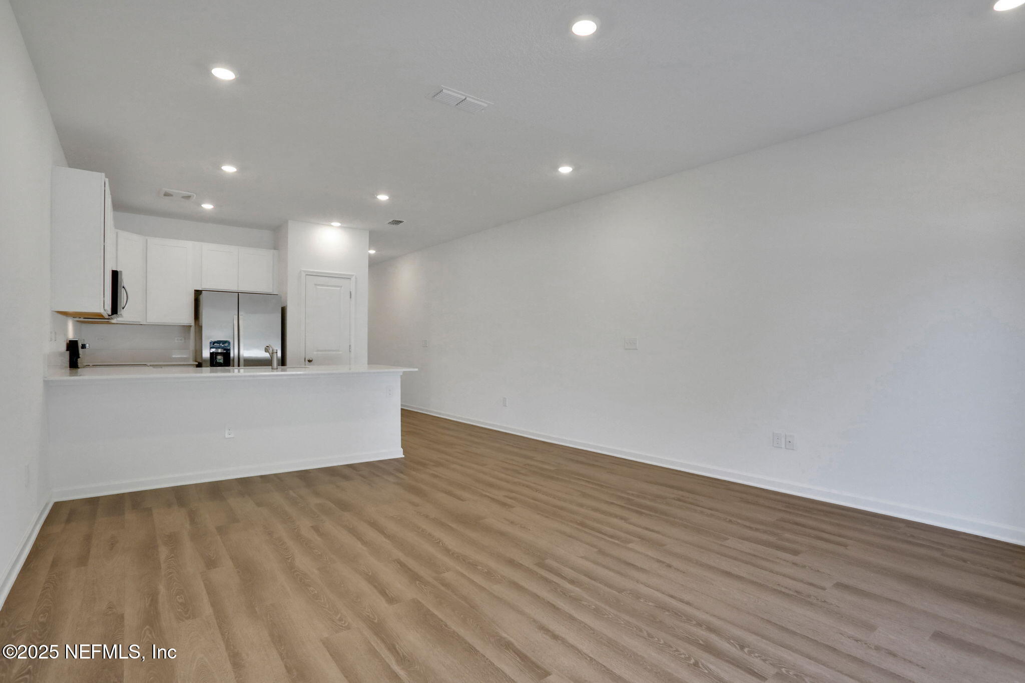 739 Sailor Grove Lane Jacksonville, FL 32221 - Photo 12 of 30 a view of kitchen with wooden floor and window