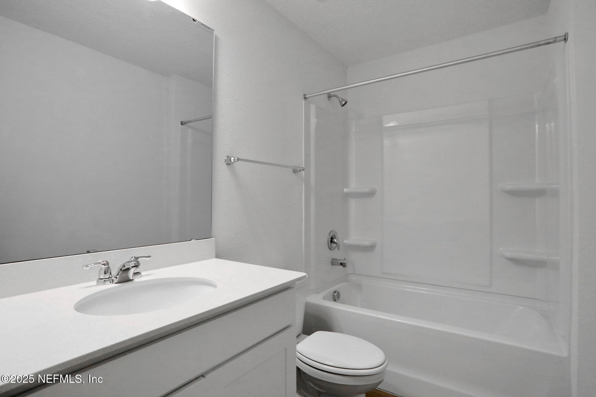 739 Sailor Grove Lane Jacksonville, FL 32221 - Photo 23 of 30 a bathroom with a granite countertop bathtub shower sink vanity mirror and toilet
