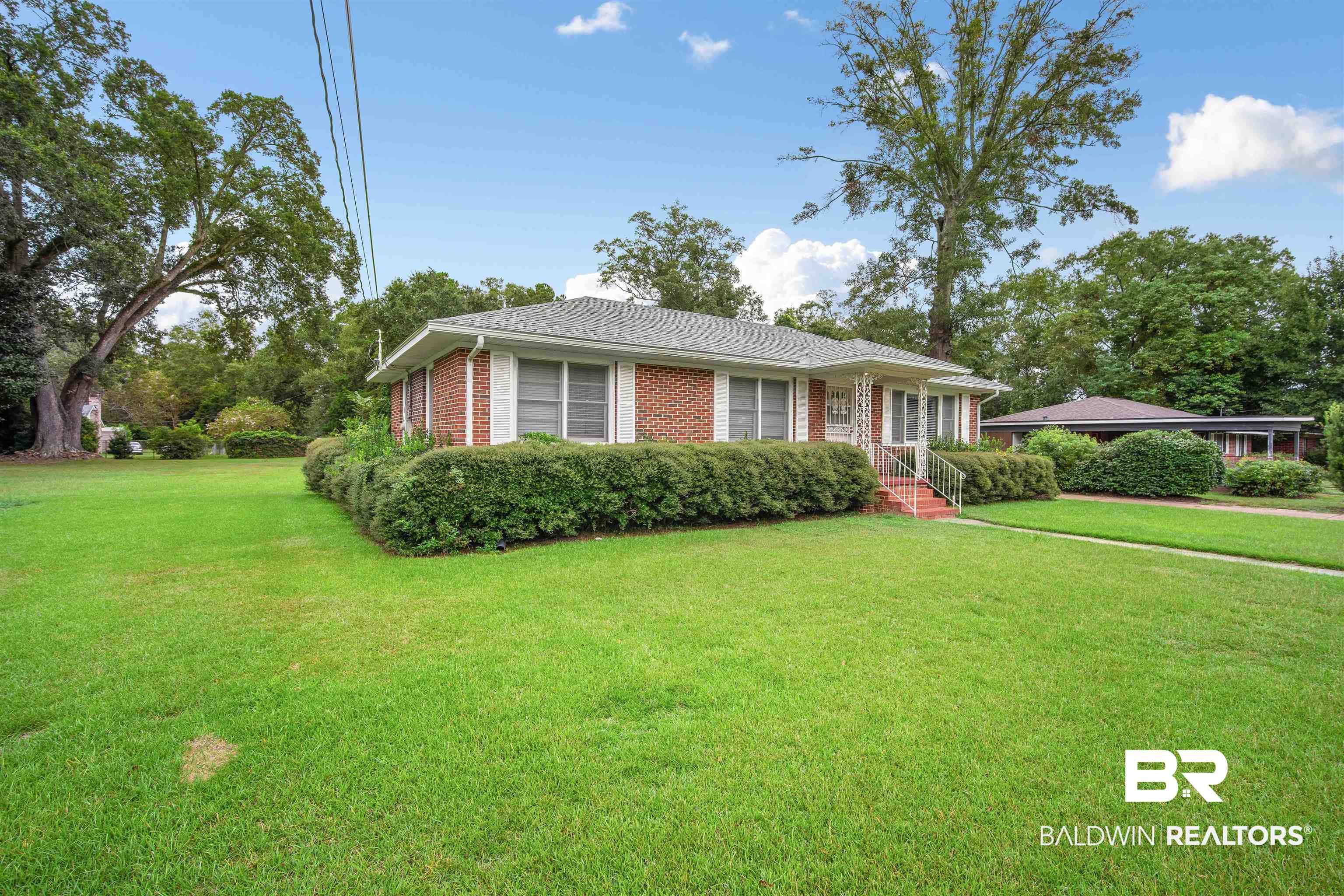 2300 Ellen Drive Mobile, AL 36605 - Photo 3 of 25 View of front of home featuring a front lawn
