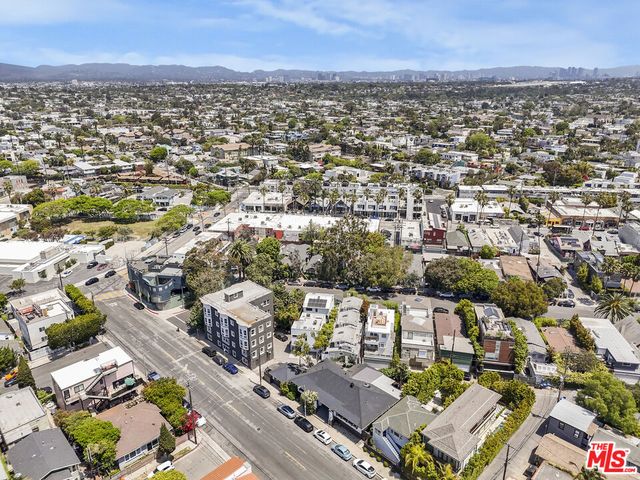 an aerial view of a city with lots of residential buildings