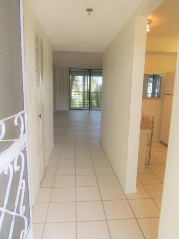 a view of hallway with windows