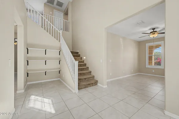a view of entryway and hall with a window
