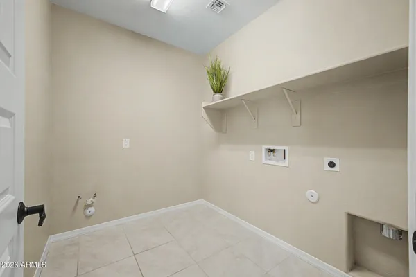 a house view with a backyard