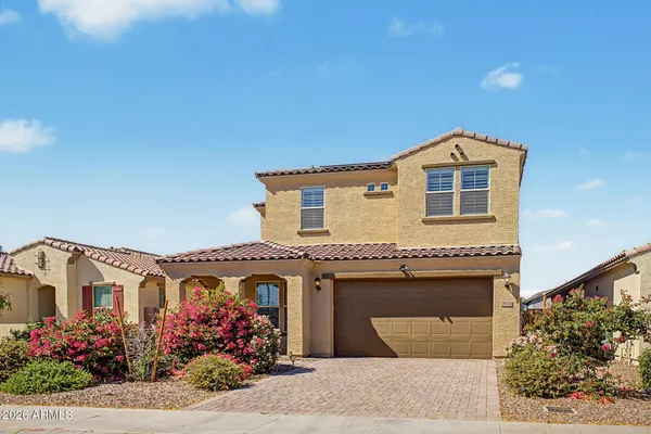 a front view of a house with an outdoor space