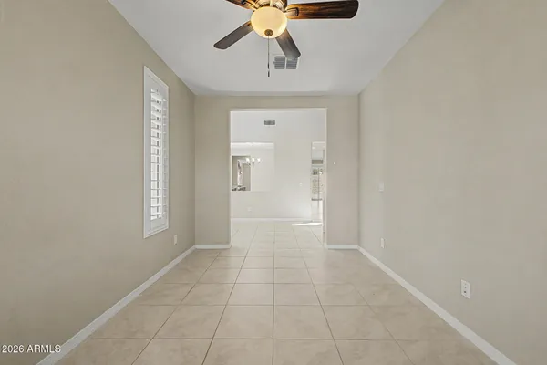 a view of an empty room and window