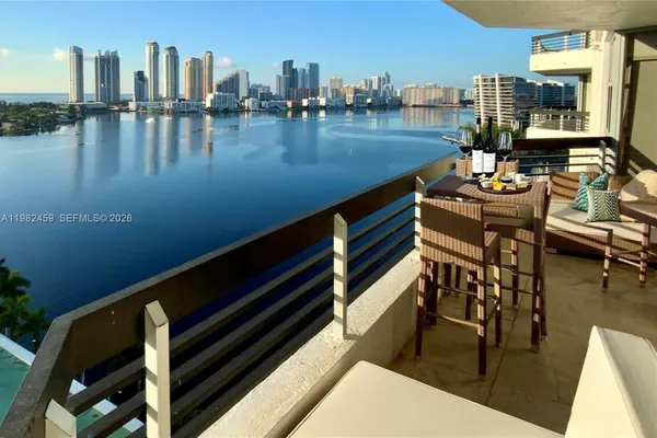 a terrace of a house with outdoor seating