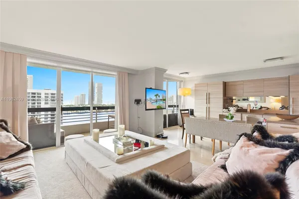 a living room with furniture and a table