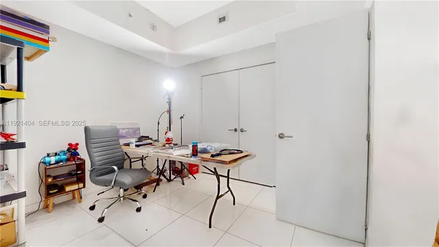 a view of a workspace with furniture