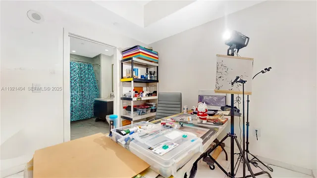 a workspace with furniture and white walls