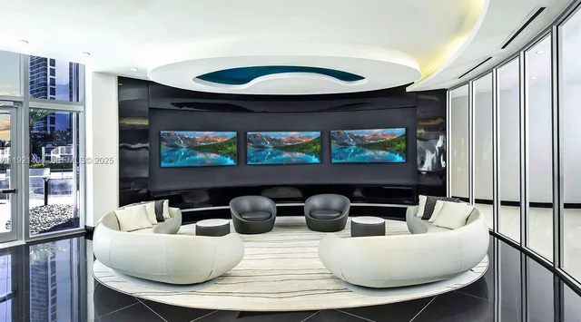 a kitchen with stainless steel appliances granite countertop a sink a stove and a microwave