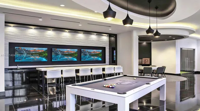 a view of swimming pool with outdoor seating