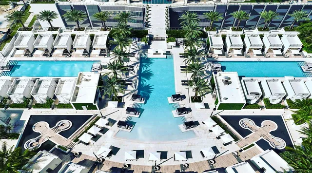 a dinning room with furniture window and wooden floor