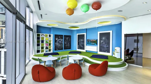 a room with lots of chairs and lots of furniture