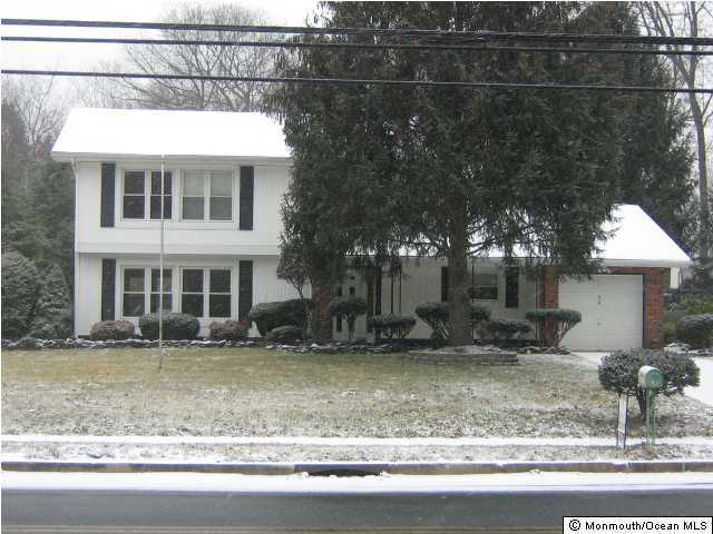 414 Brewers Bridge Road Jackson, NJ 08527 - Photo 1 of 1 a front view of a house with a yard