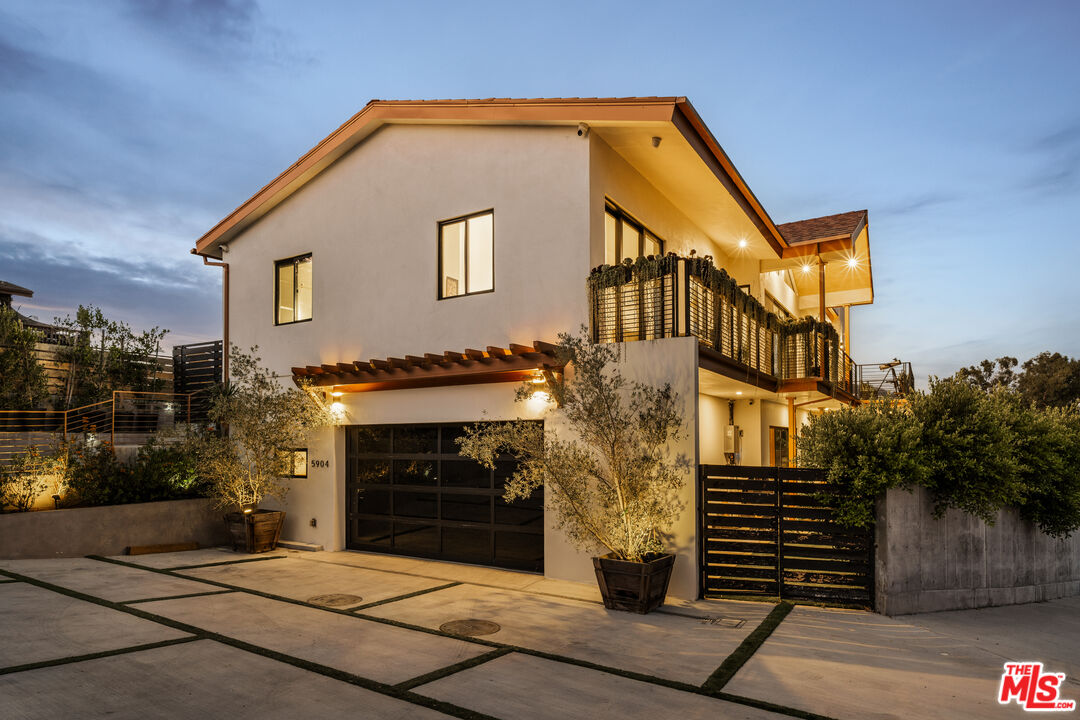 5904 Kanan Dume Road Malibu, CA 90265 - Photo 17 of 18 a front view of a house with a garden