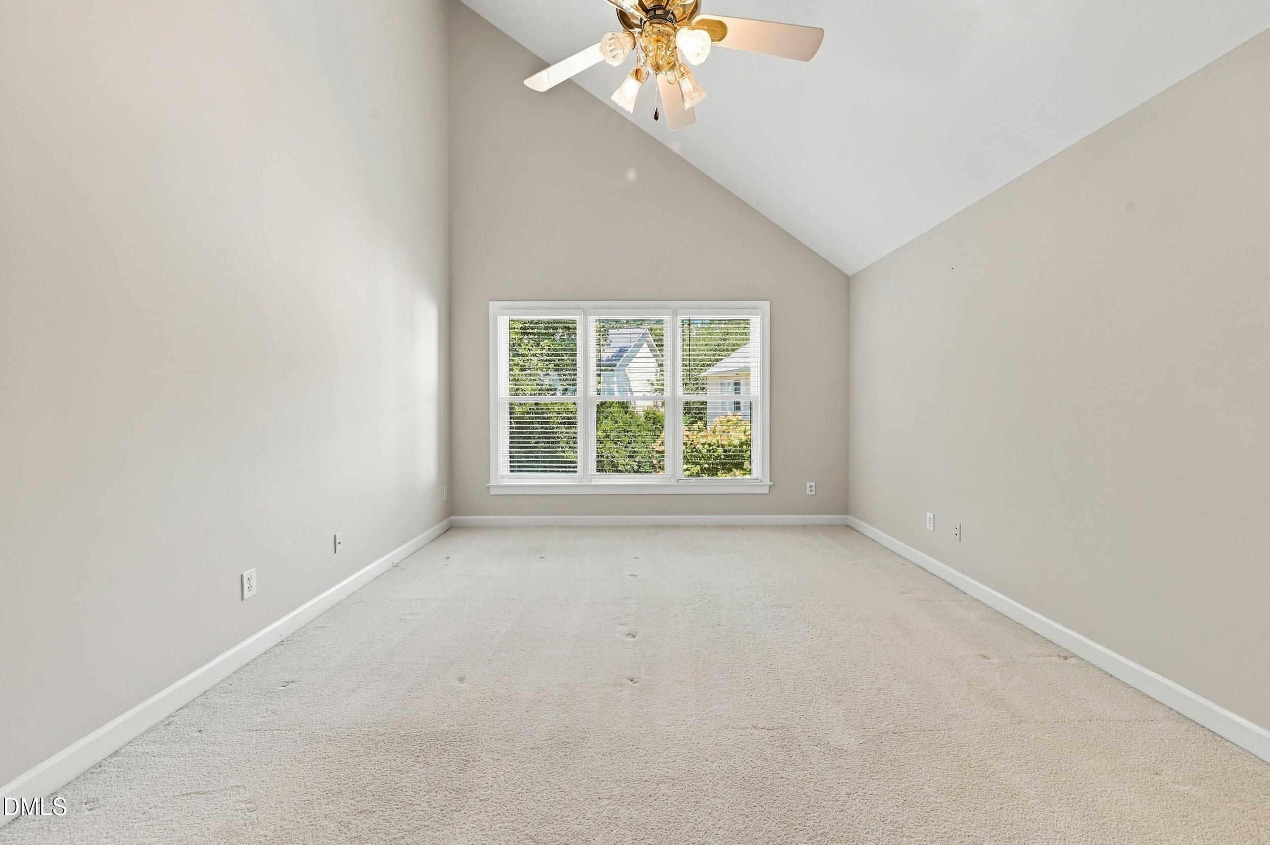 8505 Bluff Pointe Court Raleigh, NC 27615 - Photo 14 of 39 Vaulted ceiling in primary suite