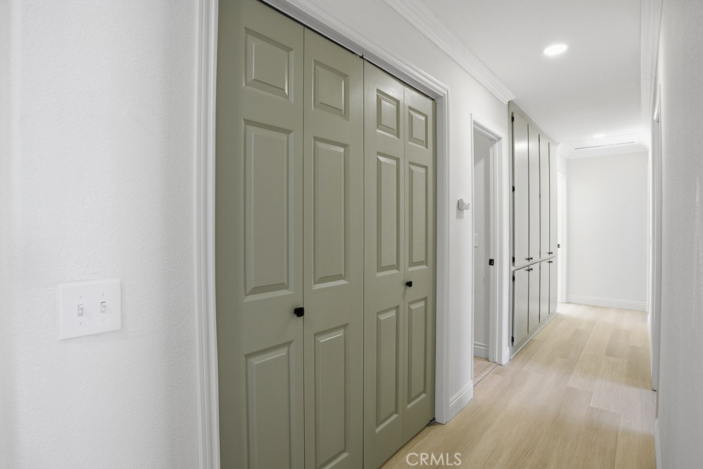7051 Idyllwild Lane Riverside, CA 92503 - Photo 20 of 40 a view of a hallway with wooden floor