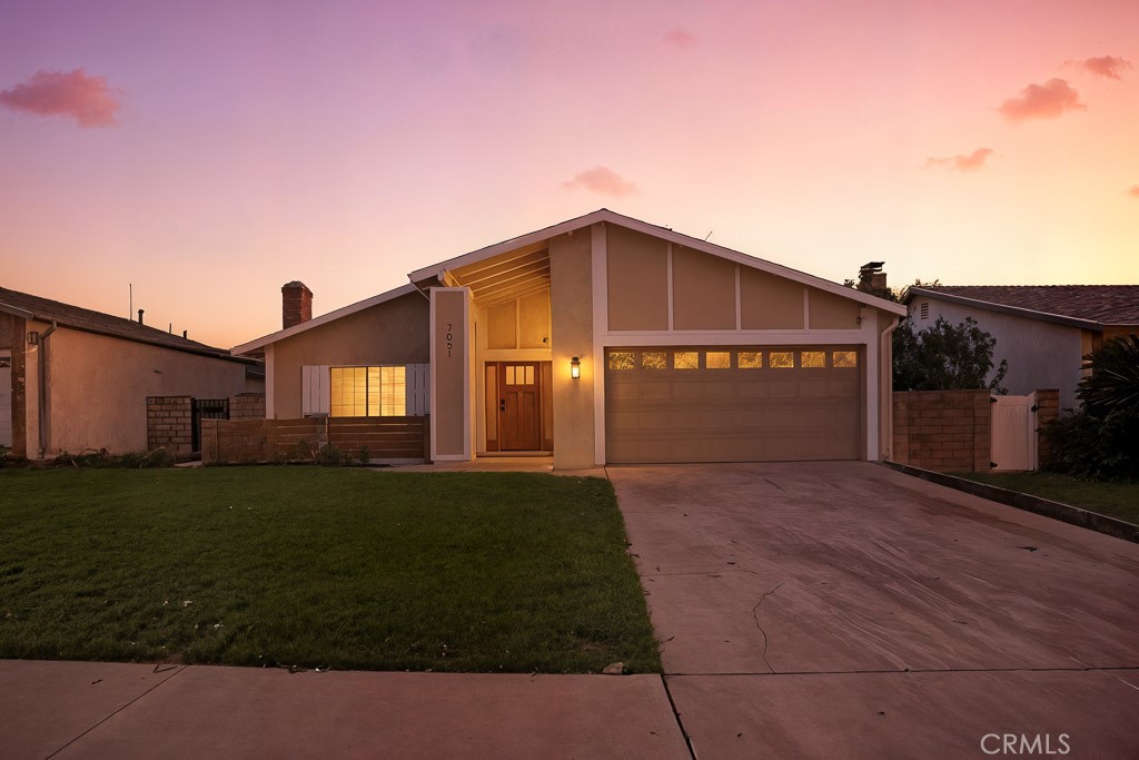 7051 Idyllwild Lane Riverside, CA 92503 - Photo 2 of 40 a front view of a house with a yard